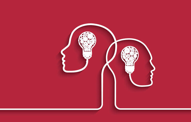 Human heads with light bulbs and gears on red background Silhouettes of two overlapping heads with light bulbs inside, symbolizing ideas or creativity on a red background.